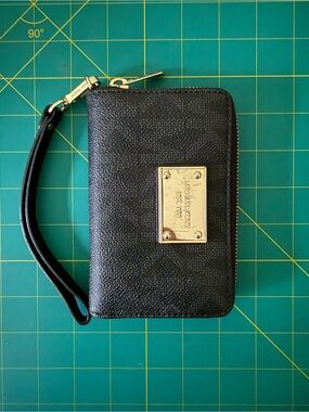Michael Kors Black Textured Wristlet with Gold Plate